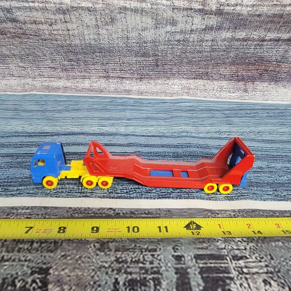 Maisto 1/64 scale die-cast red,blue and yellow car hauler no cars - Picture 1 of 8